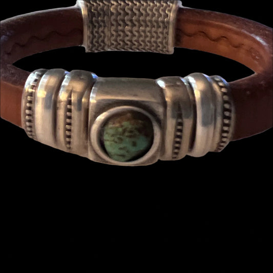 Turquoise Center on Textured Brown Leather