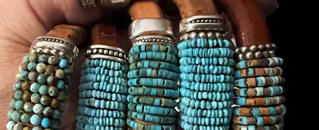 group of brown leather bracelets with turquoise beading